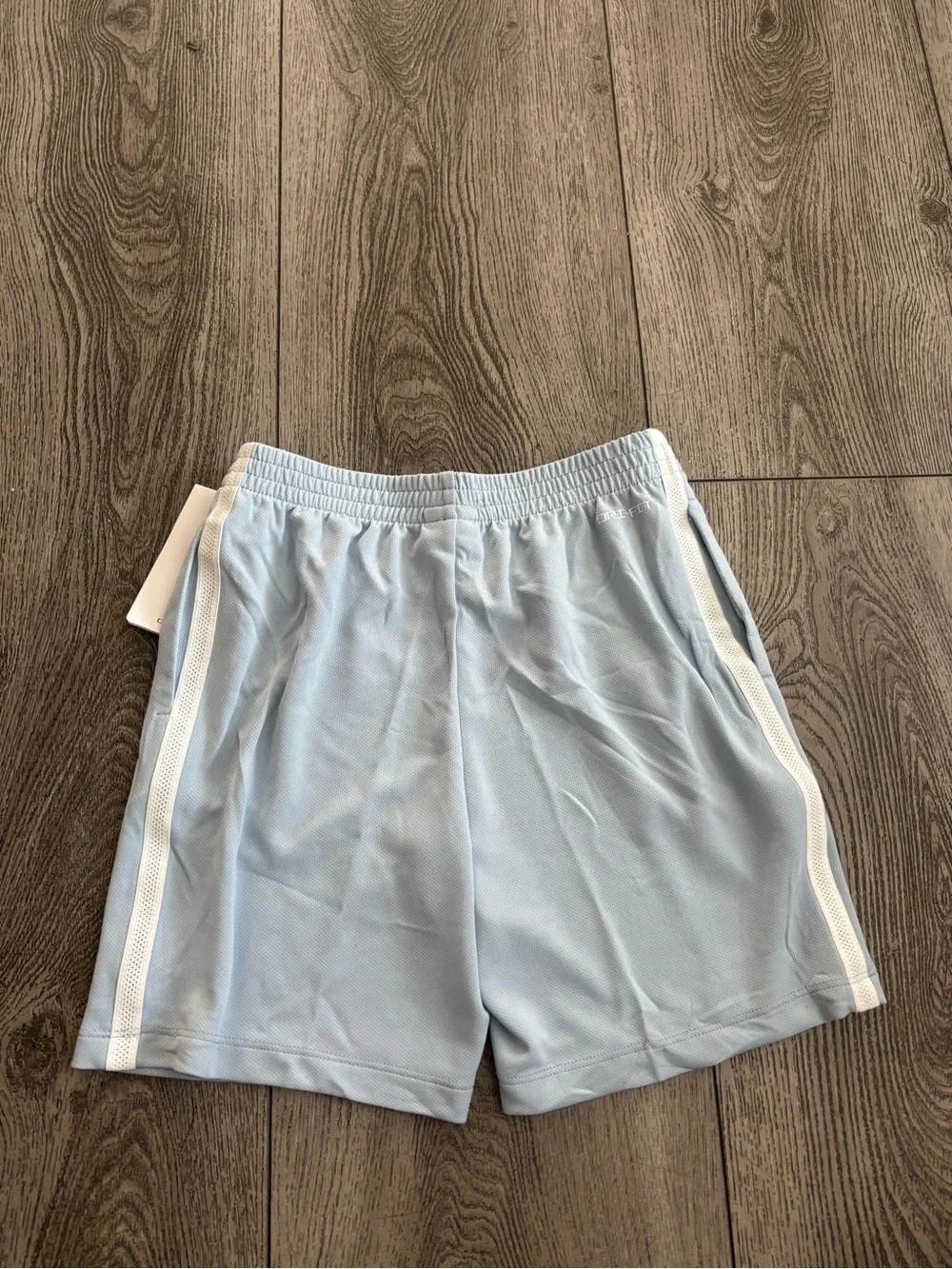 Nike kids Pale Blue Athletic Shorts with White Swoosh